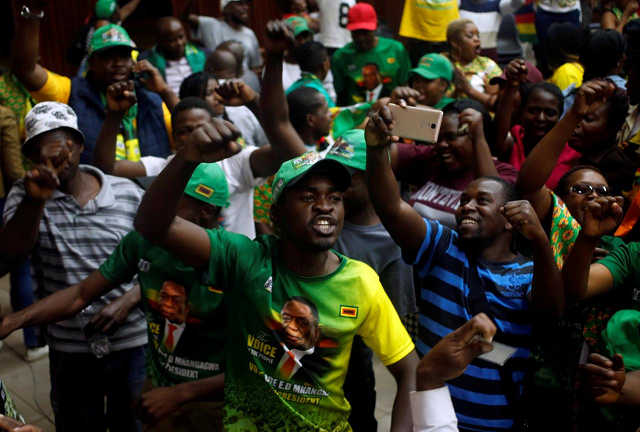 supporters of president emmerson mnangagwa 039 s ruling zanu pf party react to the results of a constitutional court hearing challenging his electoral victory in harare zimbabwe august 24 2018 photo reuters