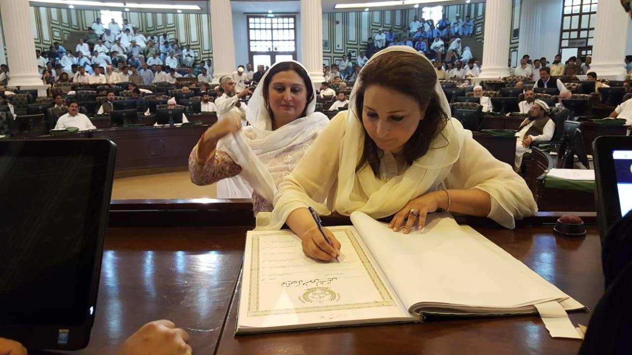 maliha asghar khan signs the register after taking oath as mpa photo maliha asghar khan