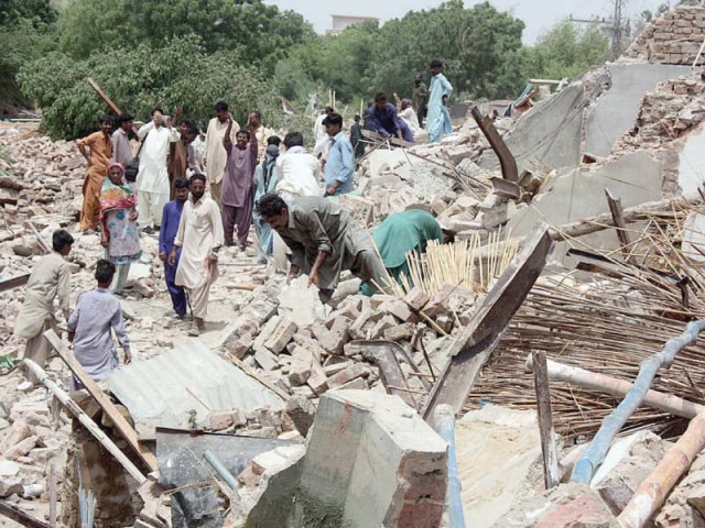 the district administration employed four cranes for the demolition operation which was led by assistant commissioner sarah javed the residents were served prior notices for evacuation photo app the district administration employed four cranes for the demolition operation which was led by assistant commissioner sarah javed the residents were served prior notices for evacuation photo app