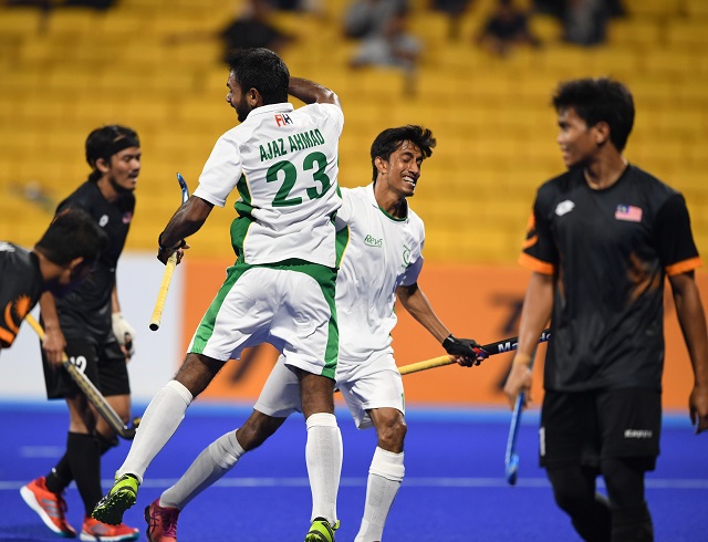 pakistan 039 s ajaz ahmad 3l and muhammad atiq 2r celebrate after score a goal against malaysia during the men 039 s hockey pool b match in jakarta on august 26 2018 photo afp