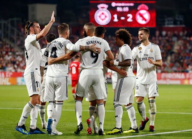 benzema s double was well supported by two individual goals by bale and captain ramos as real bagged second victory from as many matches photo afp