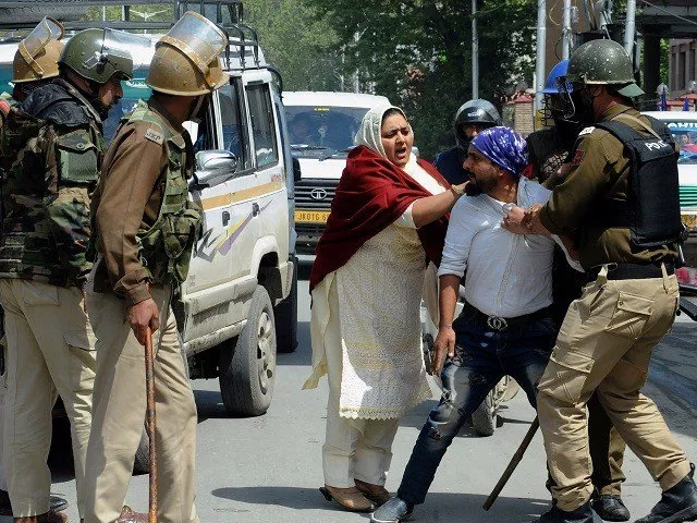 indian security personnel detain a kashmiri man during protests by students in srinagar on april 11 2018 photo afp indian security personnel detain a kashmiri man during protests by students in srinagar on april 11 2018 photo afp