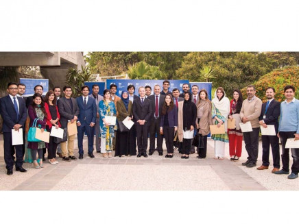 chevening alumni gathered around the high commissioner photo express
