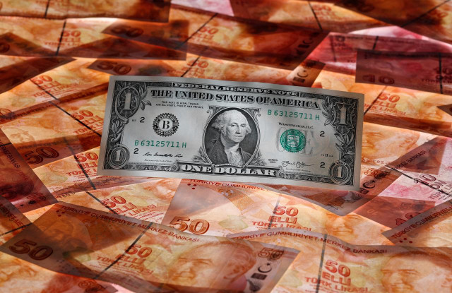 a u s dollar banknote is seen through a magnifying lens on top of 50 turkish lira banknotes in this picture illustration photo reuters a u s dollar banknote is seen through a magnifying lens on top of 50 turkish lira banknotes in this picture illustration photo reuters