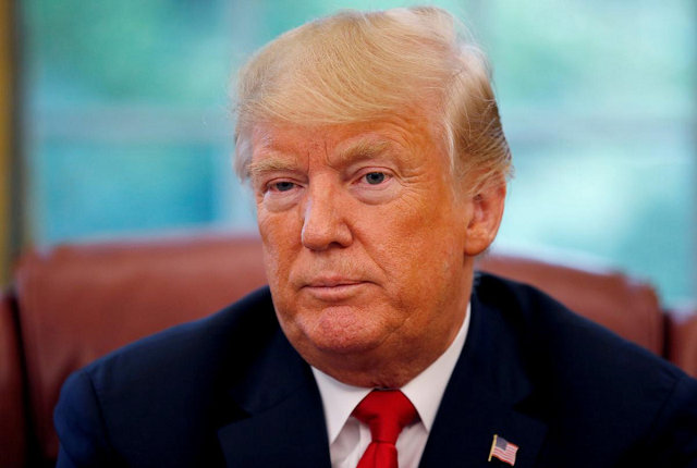 us president donald trump listens to a question during an interview with reuters in the oval office of the white house in washington us august 20 2018 photo reuters