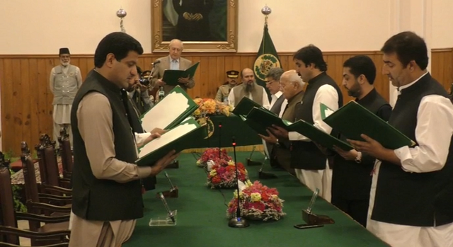 in this picture taken on august 27 2018 governor mohammad khan achakzai administers oath to the balochistan cabinet members photo express