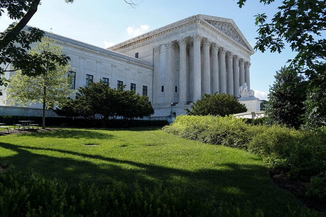 trees cast shadows outside the us supreme court in washington us june 25 2018 photo reuters