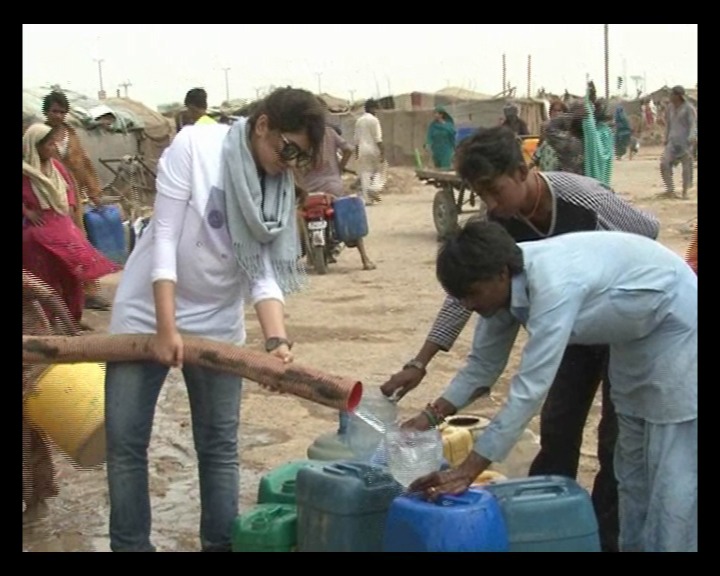 for the past four years this group of student volunteers under the name of 039 rise up for salvation 039 has been distributing water to the water scarce areas of karachi photo express