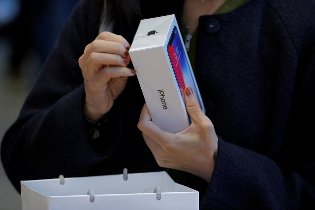 iphone x at the launch at apple 039 s retail outlet photo reuters iphone x at the launch at apple 039 s retail outlet photo reuters