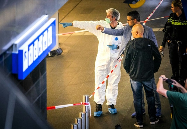 double stabbing at amsterdam station in possible terror attack