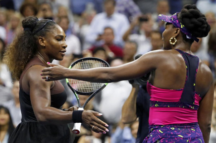 serena williams left and her sister venus embrace after their third round match on friday night at the u s open in new york photo afp