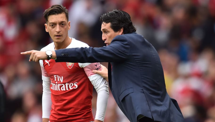 ozil 039 s arsenal career remains unfulfilled and wenger 039 s approach to getting the best out of the player has been questioned photo afp