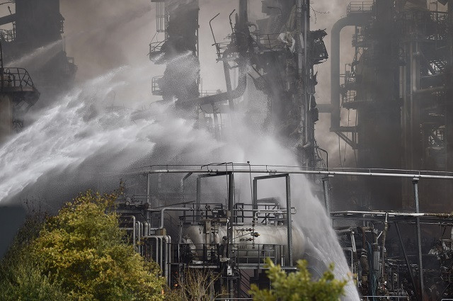fireworkers work the site of a refinery of bayernoil company where an explosion took place on september 01 2018 photo afp fireworkers work the site of a refinery of bayernoil company where an explosion took place on september 01 2018 photo afp