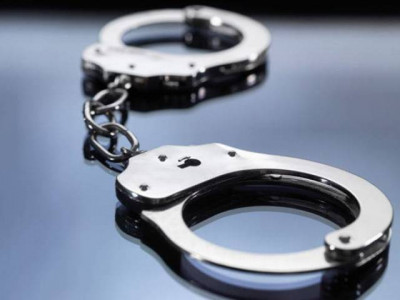 electric company official arrested