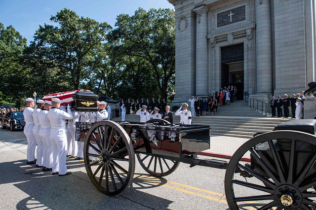 navy body bearers place the casket of late senator john mccain photo afp