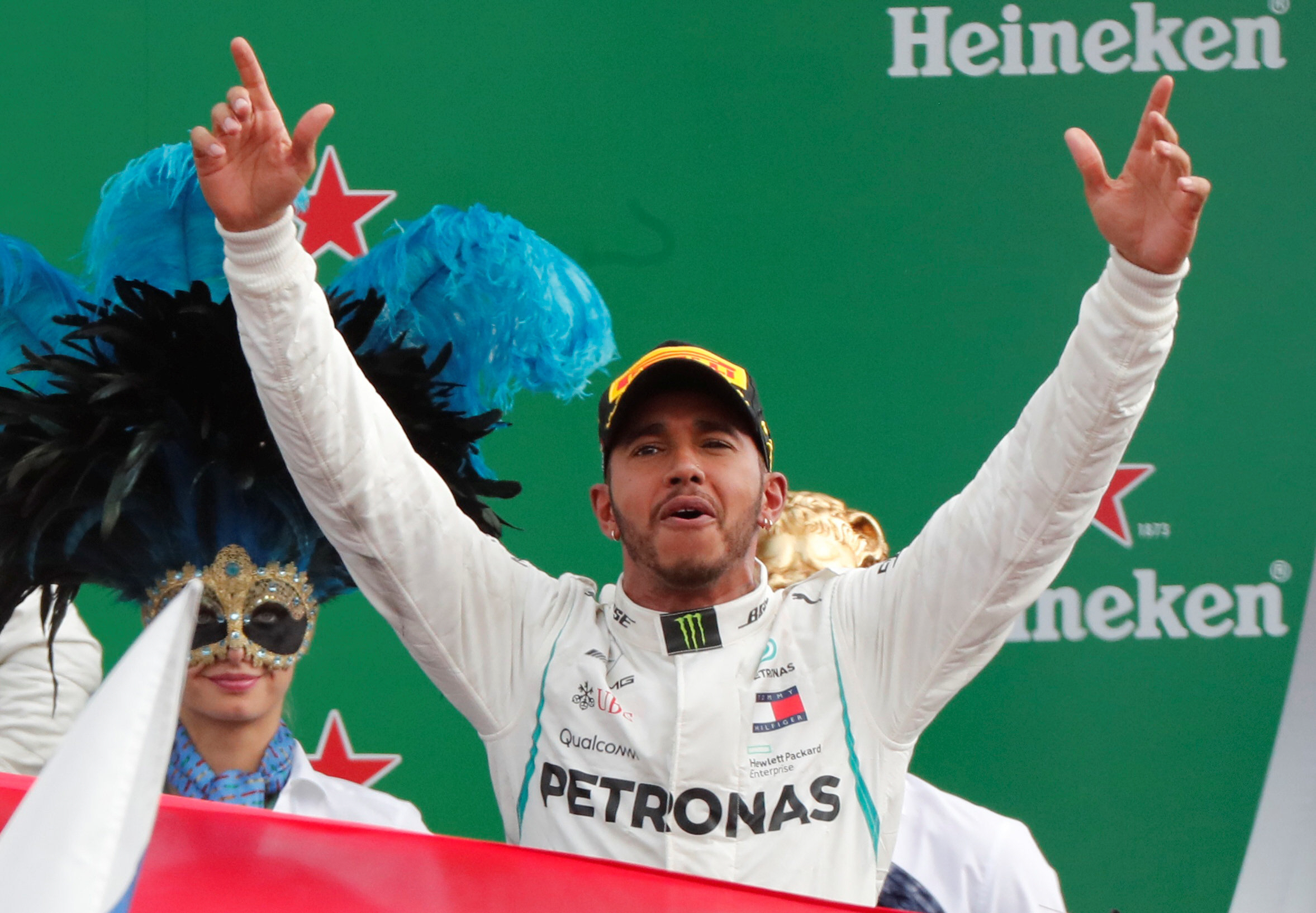 mercedes 039 lewis hamilton celebrates on the podium after winning the race photo reuters