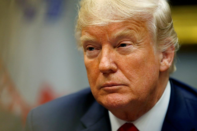 us president donald trump listens to participants during an event at which he announced a grant for a drug free communities support program in the roosevelt room of the white house in washington us august 29 2018 photo reuters