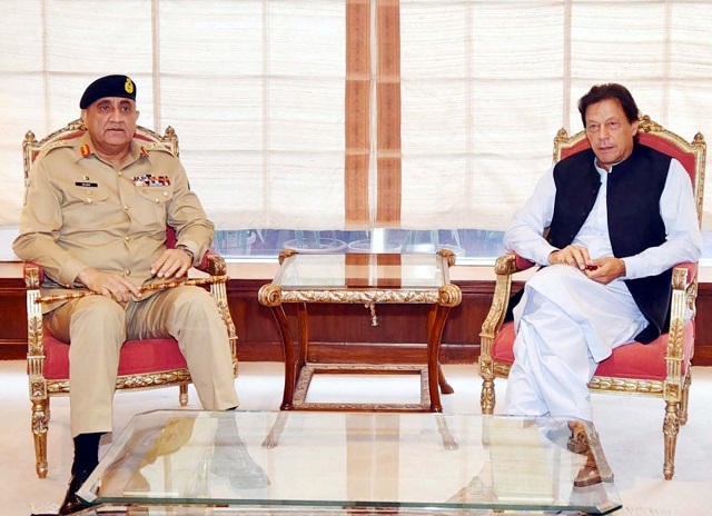 gen qamar javed bajwa meets imran khan at pm secretariat photo pid