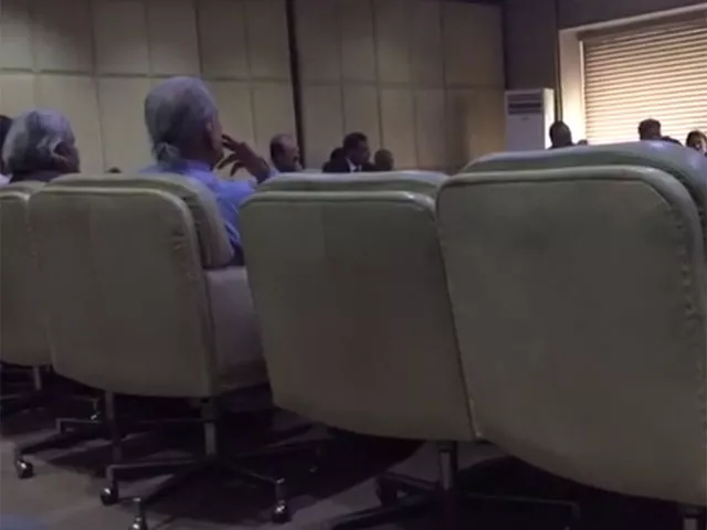 the former chairman senate is seen apparently smoking a cigar in the meeting of the senate committee video screen grab the former chairman senate is seen apparently smoking a cigar in the meeting of the senate committee video screen grab