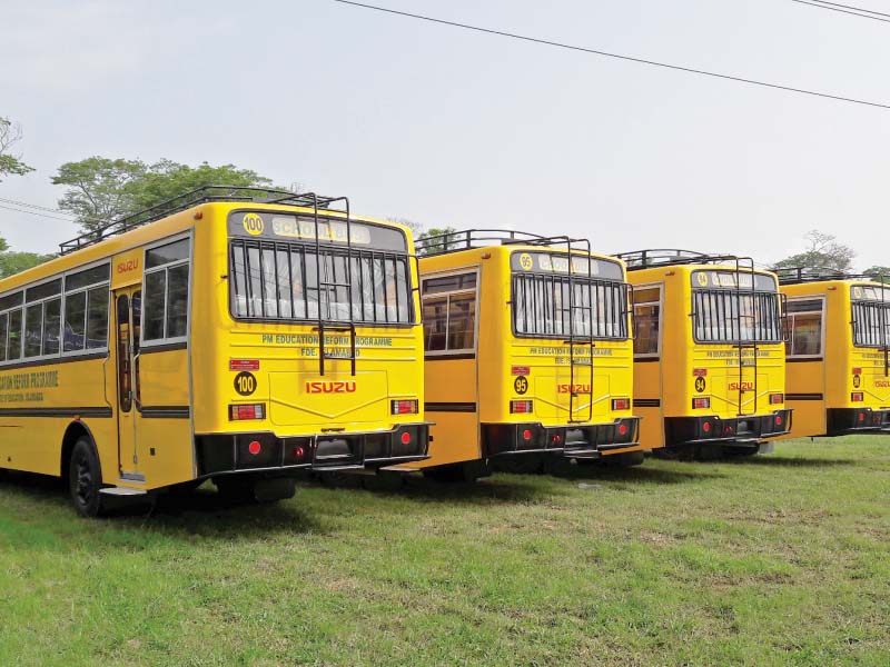 view of an array of yellow school buses parked in islamabad model postgraduate college h 8 photo express