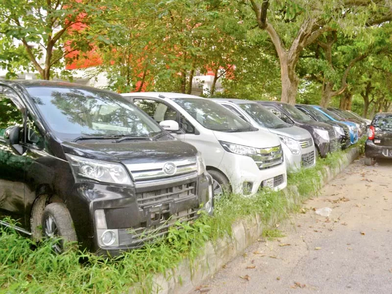 cars are parked on a section of the greenbelt by showroom owners in union council 32 in sector g 8 photo waseem nazir express cars are parked on a section of the greenbelt by showroom owners in union council 32 in sector g 8 photo waseem nazir express