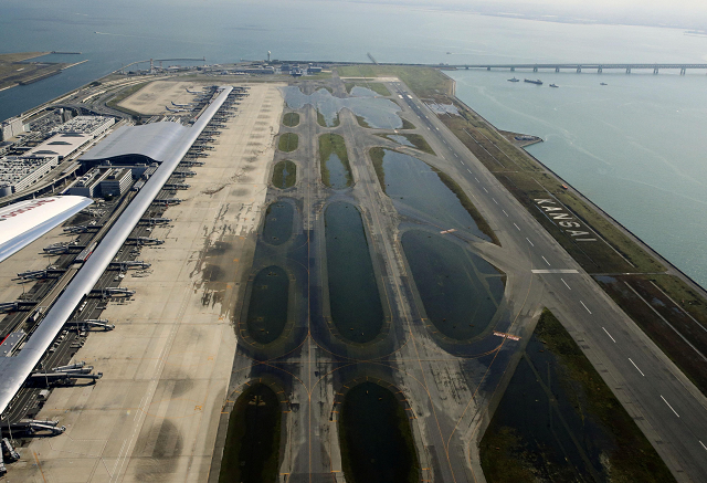 an aerial view shows a flooded runway at kansai airport photo reuters
