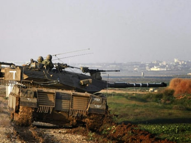 an israeli tank at the gaza border photo afp file an israeli tank at the gaza border photo afp file