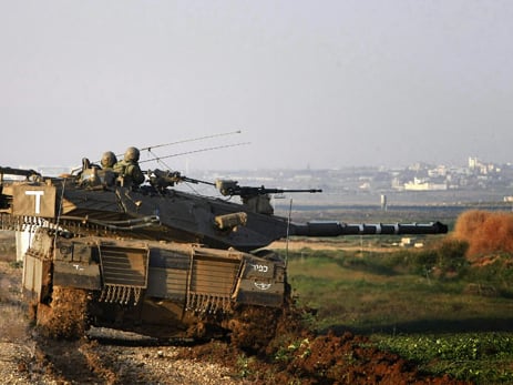 an israeli tank at the gaza border photo afp file