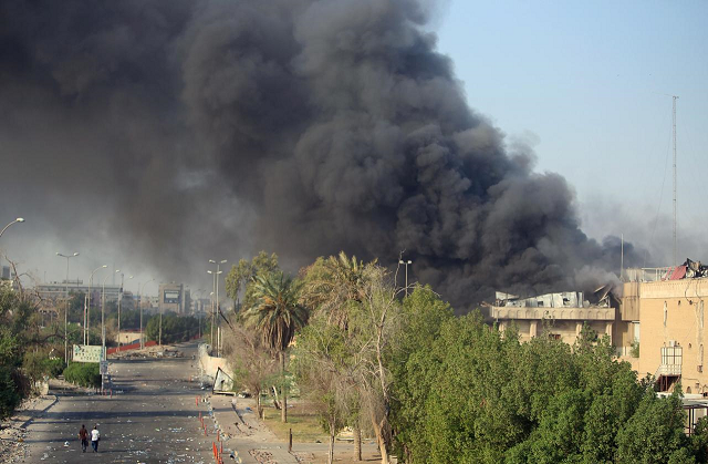 smoke rises from the governorate and municipalities buildings of basra iraq september 6 2018 photo reuters