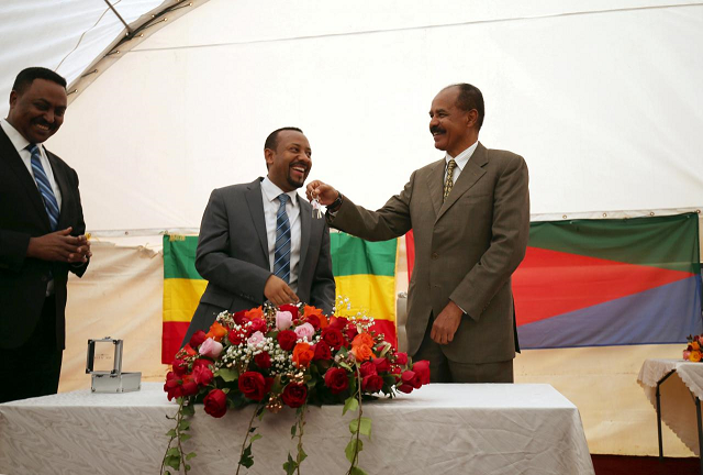 eritrea 039 s president isaias afwerki receives a key from ethiopia 039 s prime minister abiy ahmed during the inauguration ceremony marking the reopening of the eritrean embassy in addis ababa ethiopia july 16 2018 photo reuters