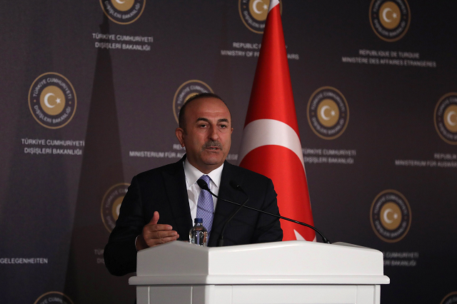 turkish foreign minister mevlut cavusoglu speaks during a joint press conference following his meeting with german foreign minister photo afp