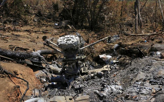 the chopper 039 s wreckage had been spotted on a forested hillside in neighbouring dhadhing district photo reuters