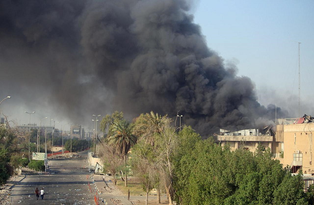 smoke rises from buildings of basra photo reuters