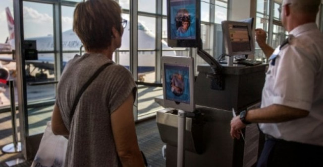 facial recognition systems are being used to speed the boarding process at dulles international airport and may eventually eliminate the need for a board pass photo afp facial recognition systems are being used to speed the boarding process at dulles international airport and may eventually eliminate the need for a board pass photo afp