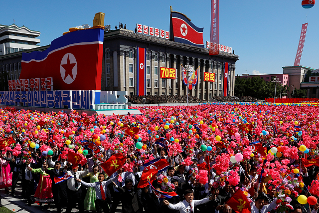 people wave plastic flowers and balloons during a military parade marking the 70th anniversary of north korea 039 s foundation in pyongyang photo reuters people wave plastic flowers and balloons during a military parade marking the 70th anniversary of north korea 039 s foundation in pyongyang photo reuters