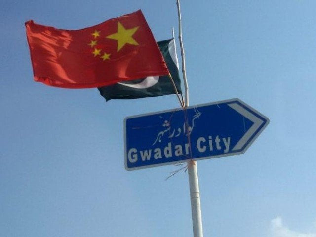 chinese and pakistani flags fly on a sign along a road towards gwadar photo reuters chinese and pakistani flags fly on a sign along a road towards gwadar photo reuters