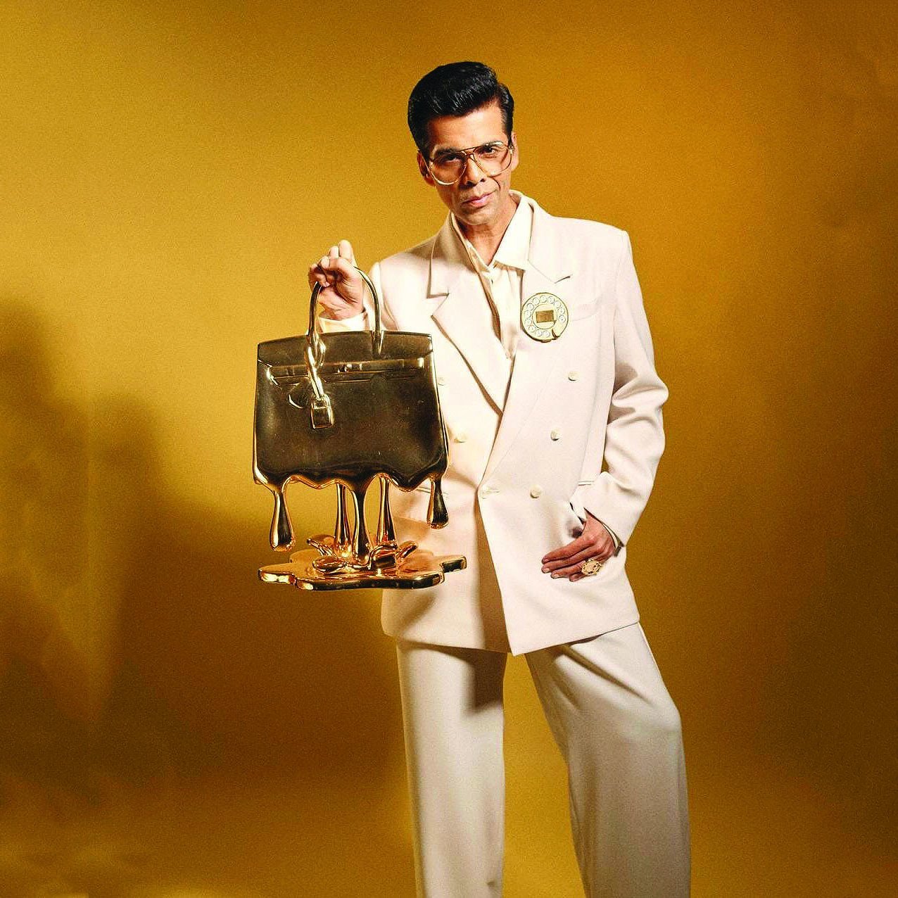 karan paired a cream suit with a birkin sculpture by sanuj birla photo instagram