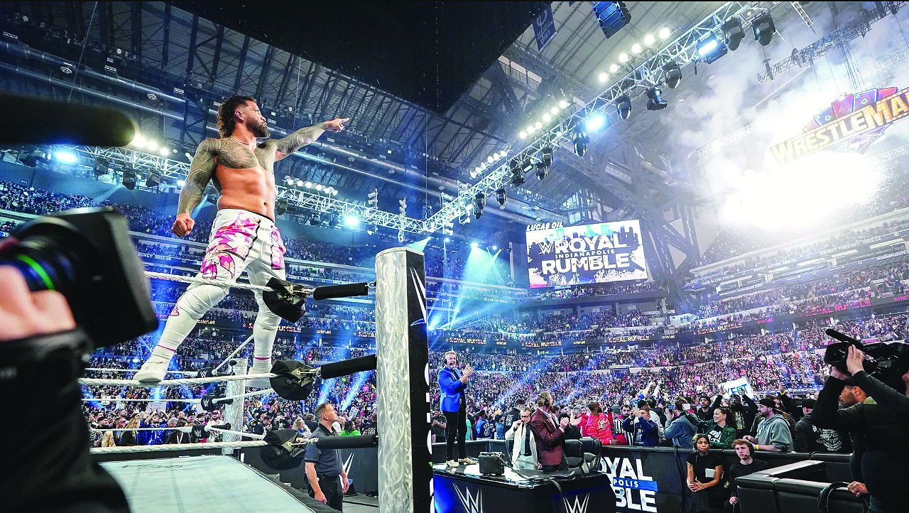 winner jey uso points at the wrestlemania sign as fireworks erupt photo publicity