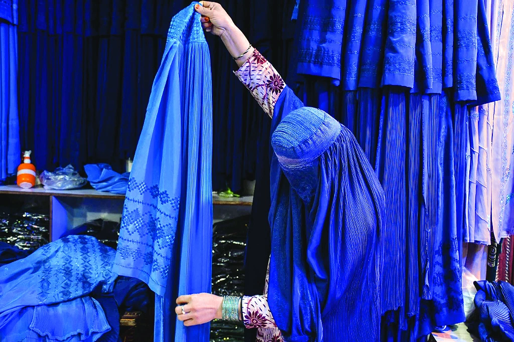 the blue burqa has become a symbol of taliban oppression photo afp the blue burqa has become a symbol of taliban oppression photo afp