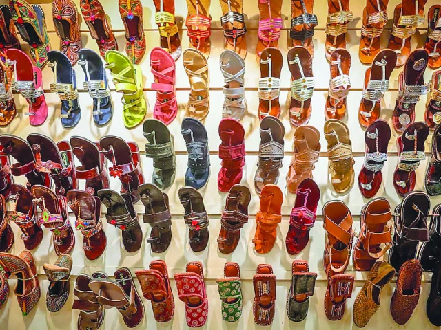 kolhapuri sandals on display at a store in new delhi photo reuters kolhapuri sandals on display at a store in new delhi photo reuters