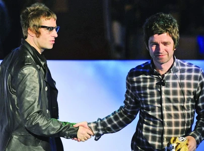 oasis fans flock to cardiff for long awaited comeback