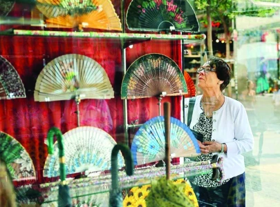 designer fan frenzy sweeps across sweltering spain designer fan frenzy sweeps across sweltering spain