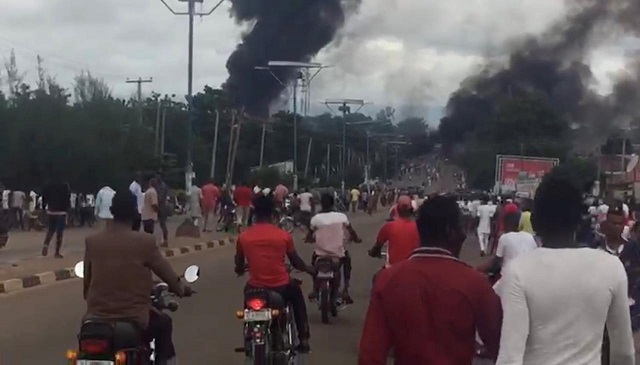 smoke and fire are seen during a gas explosion in nigeria photo reuters courtesy twitter fauxhemian