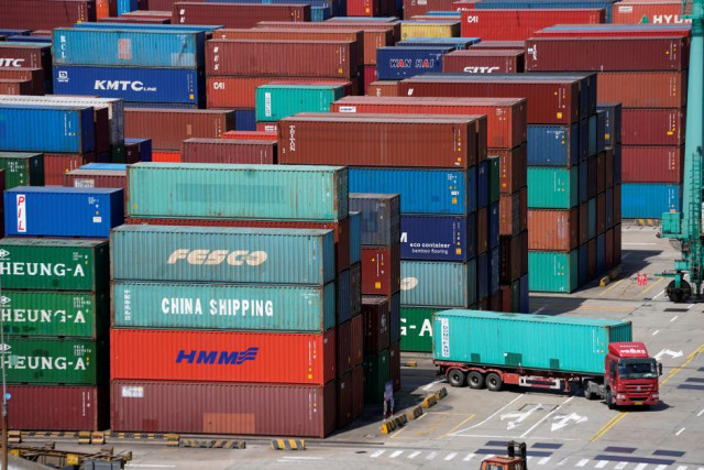 shipping containers are seen at a port photo reuters shipping containers are seen at a port photo reuters