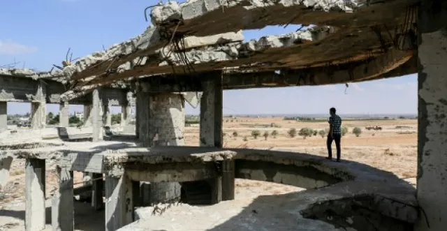 a man stands in the rubble of the gaza airport photo afp a man stands in the rubble of the gaza airport photo afp