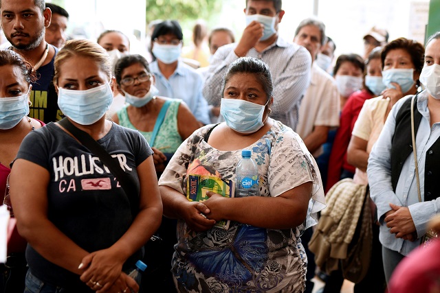 relatives of missing persons are seen outside the morgue after attending a viewing of photographs of clothing accessories and identification cards found on bodies recovered recently from mass graves in xalapa in the mexican state of veracruz mexico september 11 2018 photo reuters