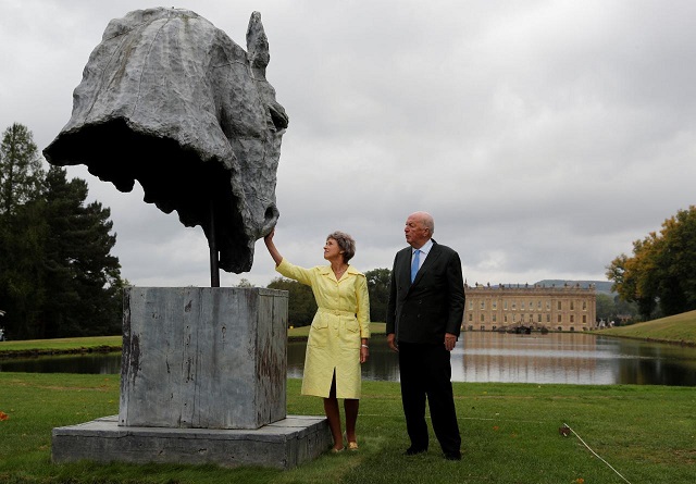 the duke and duchess of devonshire look at a sculpture entitled quot into the wind quot by nic fiddian green during the chatsworth outdoors exhibition at chatsworth house near edensor britain september 12 2018 photo reuters