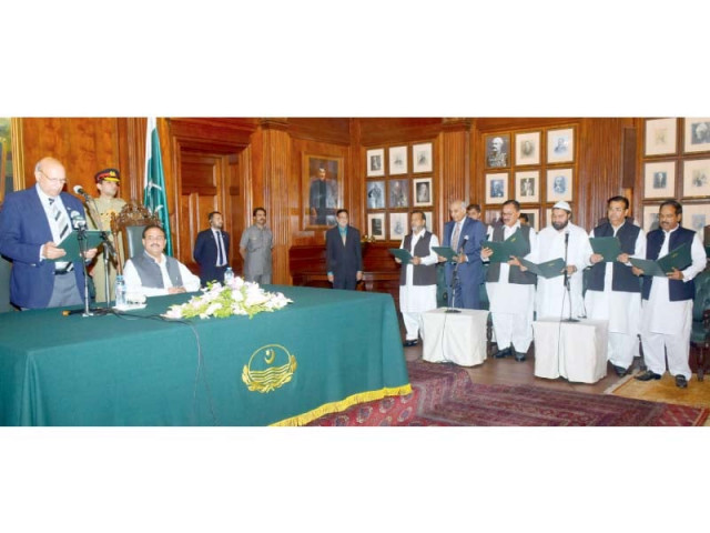 punjab governor chaudhry sarwar administers oath to the new ministers photo express punjab governor chaudhry sarwar administers oath to the new ministers photo express