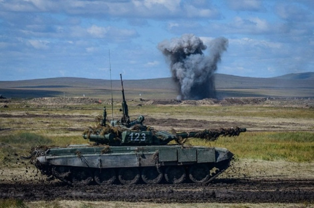 a russian tank participates in the vostok 2018 military drills at tsugol training ground not far from the chinese and mongolian border in siberia photo afp a russian tank participates in the vostok 2018 military drills at tsugol training ground not far from the chinese and mongolian border in siberia photo afp