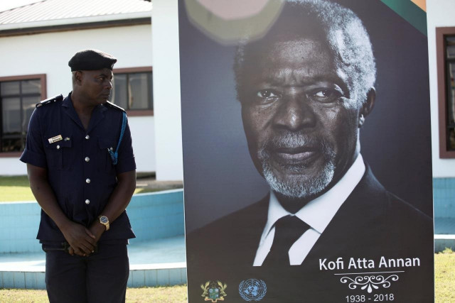 a security officer looks at a poster of the former united nations secretary general kofi annan who died in switzerland before the arrival of his casket ahead of a state funeral at the jubilee airport in accra ghana september 10 2018 photo reuters a security officer looks at a poster of the former united nations secretary general kofi annan who died in switzerland before the arrival of his casket ahead of a state funeral at the jubilee airport in accra ghana september 10 2018 photo reuters